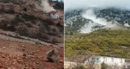 Alanya’da dağdan kopan kaya parçaları bahçe duvarlarına zarar verdi
